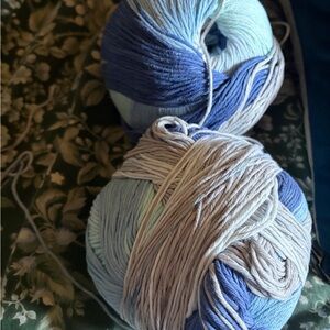 Loops and threads two full Blue and White Yarn Balls. I believe are 100% cotton.